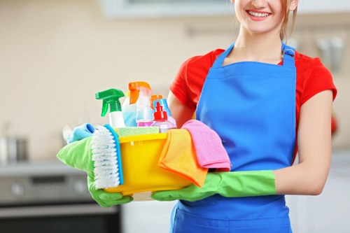 Technician using protective equipment while carrying out carpet cleaning